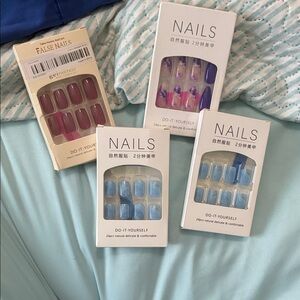 4 boxes of press on nails. 20 nails per box.